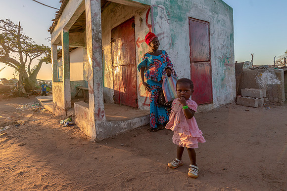 02 Gambia Mother and Child Fishing Village Boat © Bob Riach