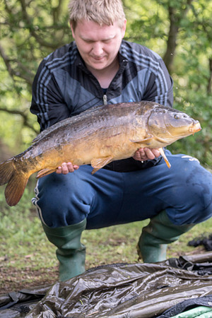 Ashby Ville Fisherman with a   Carp 18lb   Scunthorpe © Bob Riach